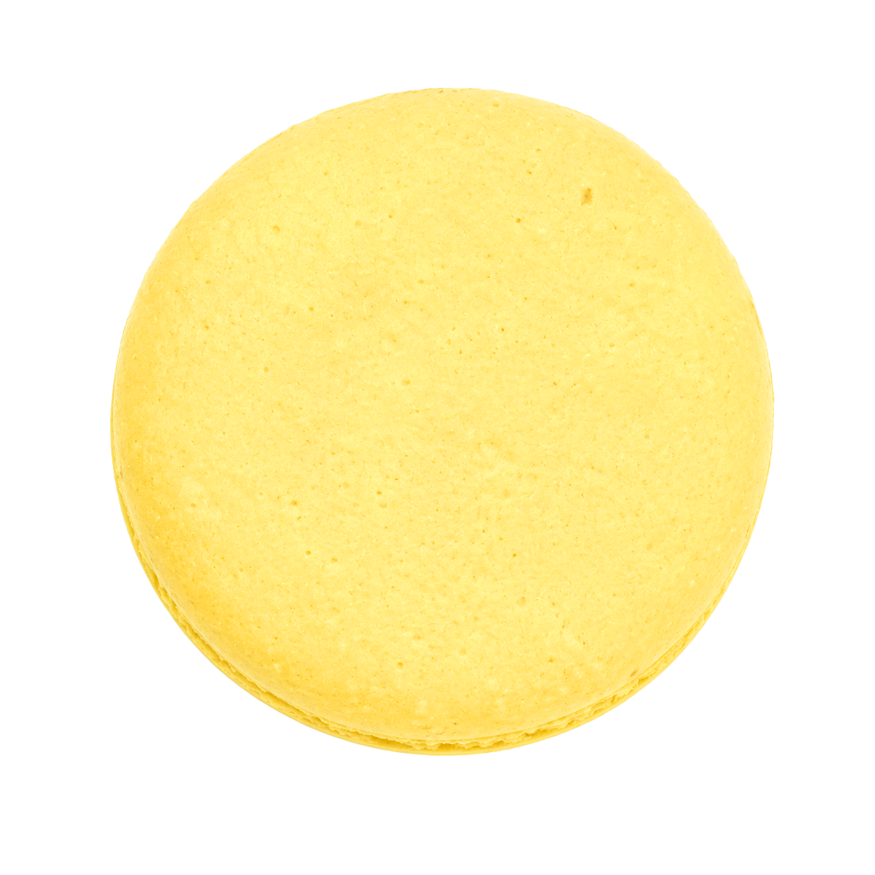 Yellow macaron shell on a white background