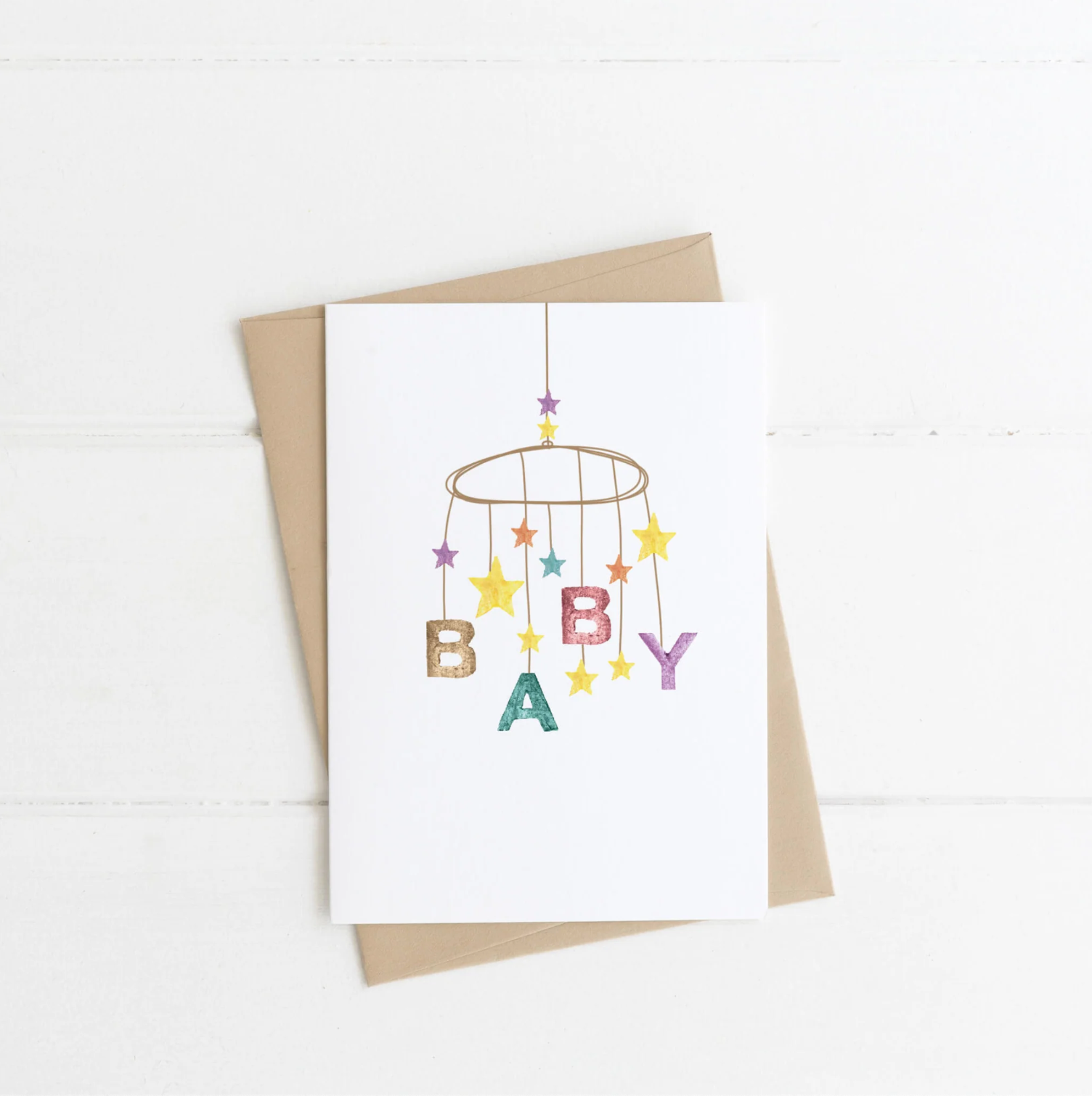 Greeting card with 'Baby' mobile design on a white background