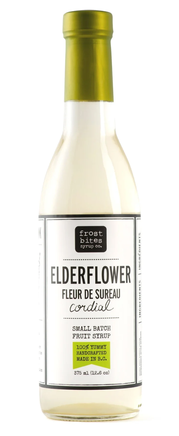 Bottle of Elderflower syrup with a gold cap on a white background